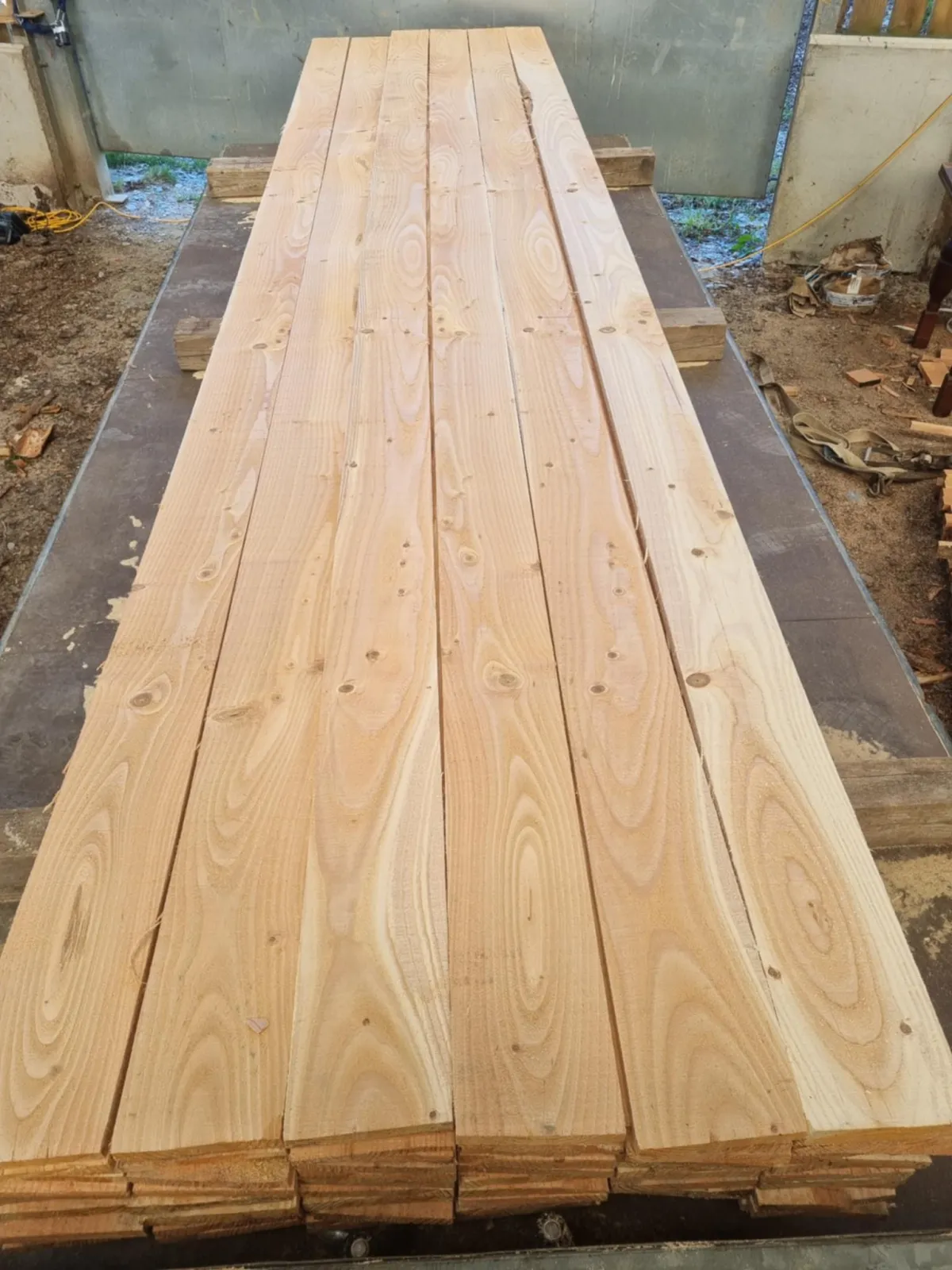 Freshly sawn boards stacked and ready for delivery